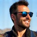 Carlos F. from Spain with sunglasses enjoying mountain views